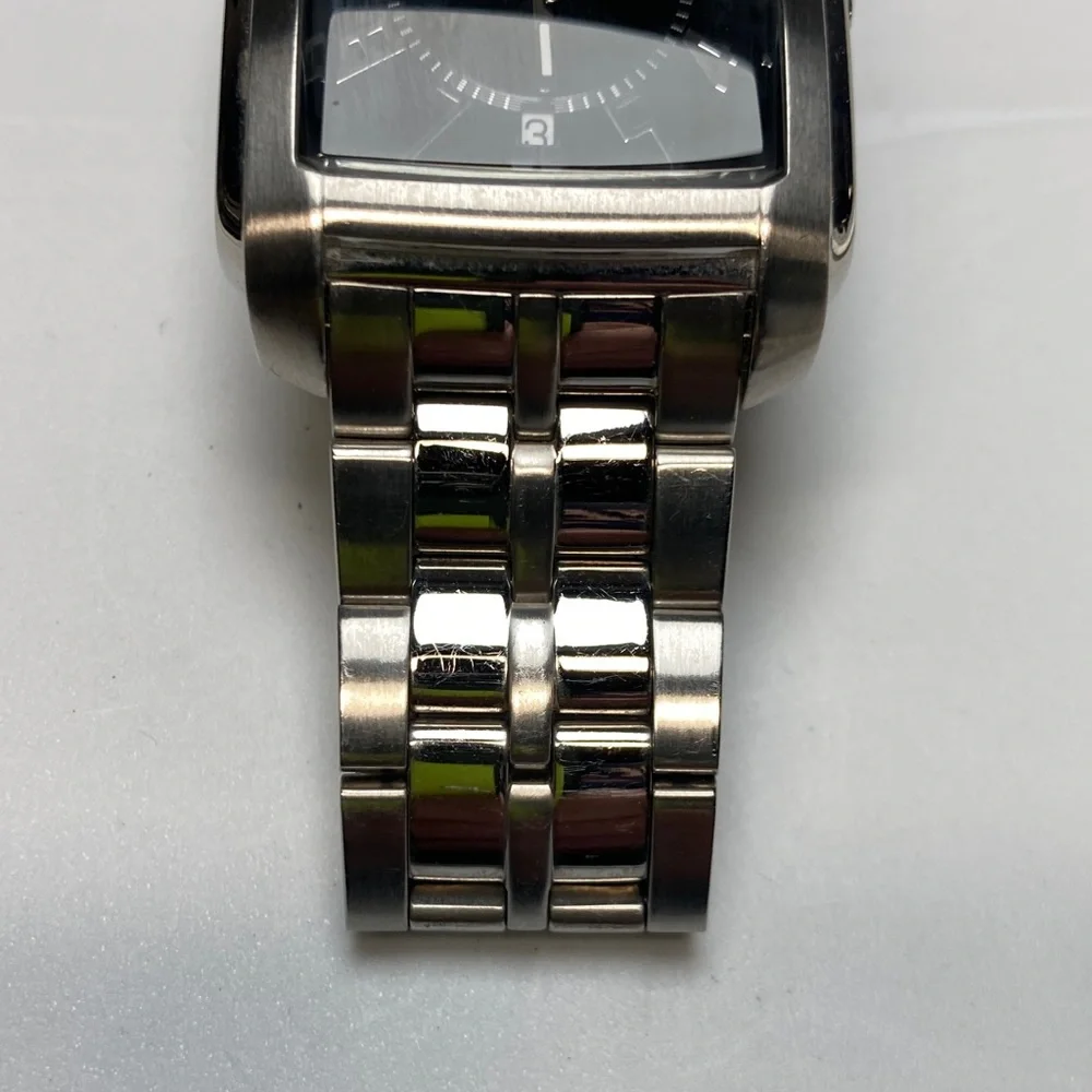 Kenneth Cole Reaction tank watch, stainless, black dial, new battery